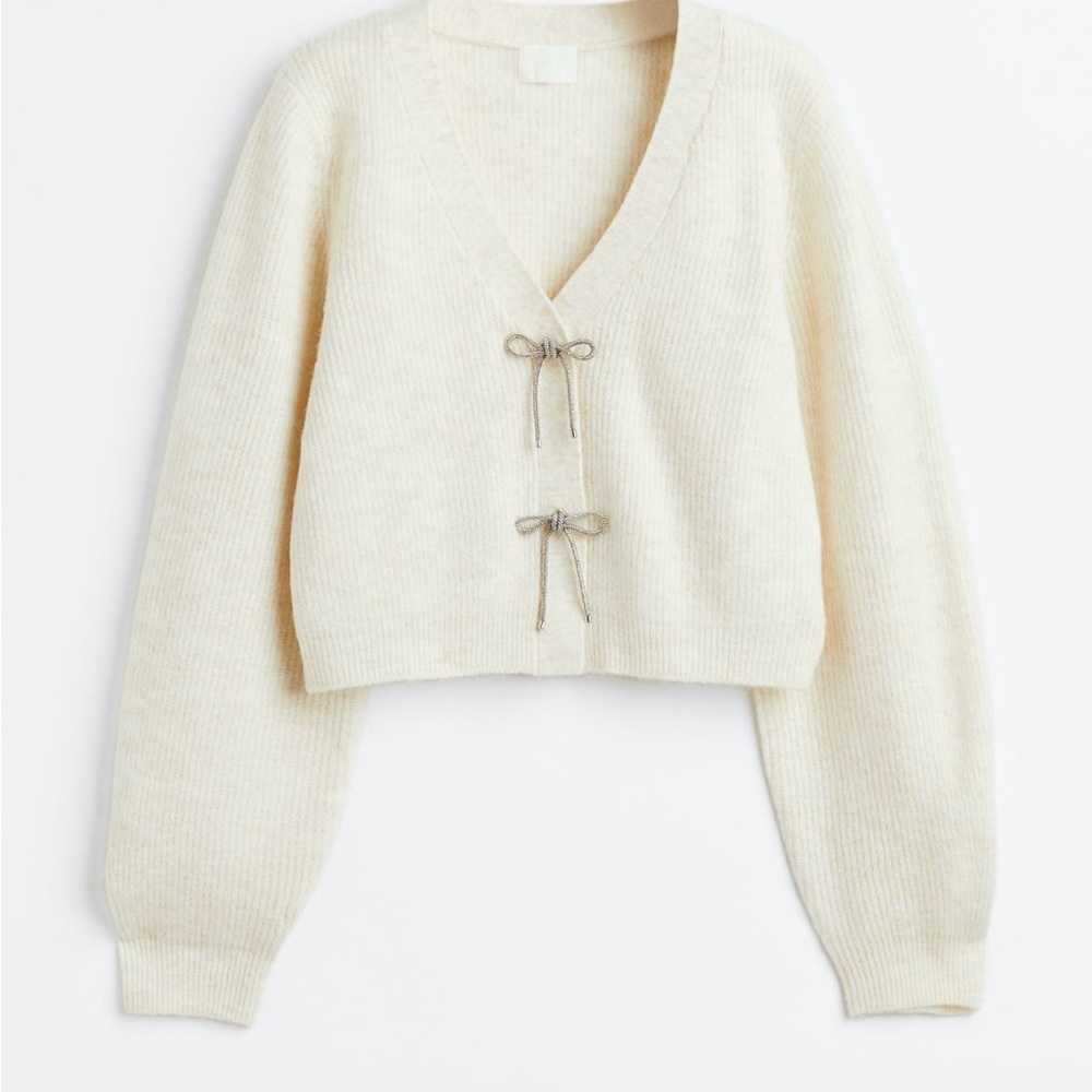 ISO HM bow button sweater size small or medium.